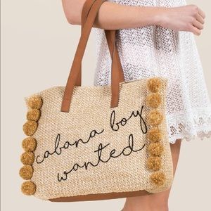 Straw beach bag with Pom Poms